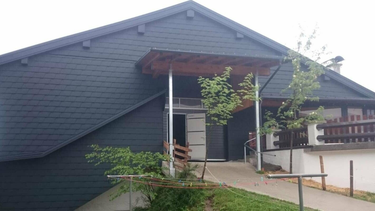 Renovation of hay loft façade with PREFA façade shingles