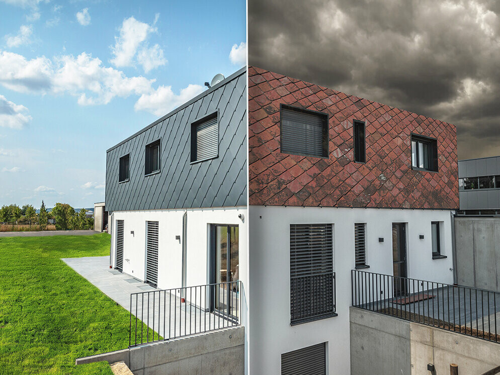 One hand holds a smartphone with a photo of a house with the PREFA photo service - you can recognise the house with and without a PREFA roof.